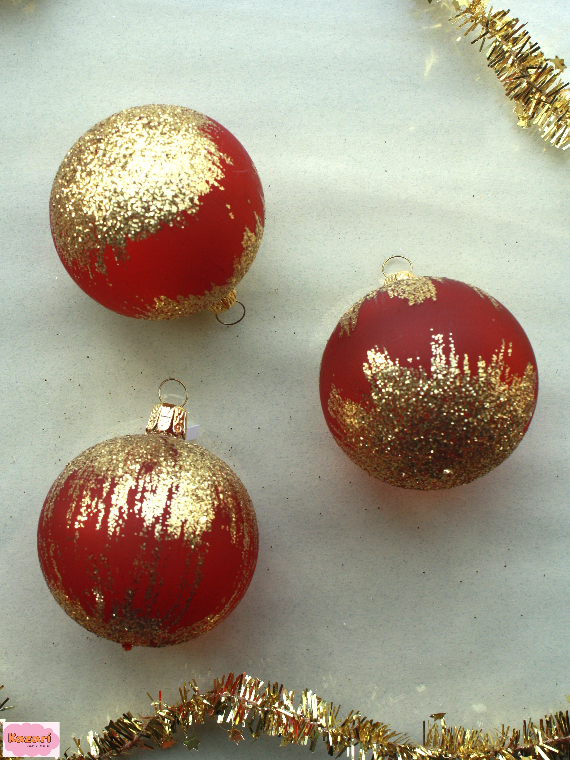 Glaskugle med guld glimmer